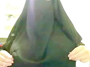 arabian muslim ummah lady in dark burqa shows